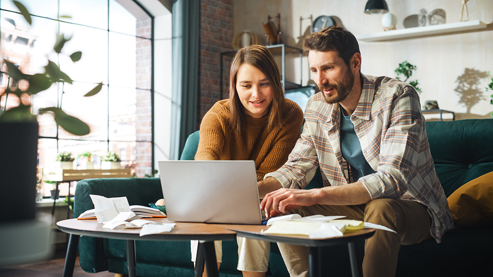 young couple working on finances